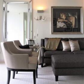 Hawthorn Apartment by Lewisham Interiors – contemporary living room with neutral tones, modern artwork, and layered textures
