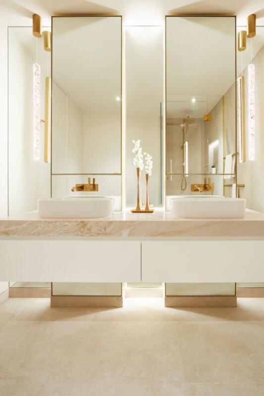 Southbank Penthouse bathroom by Lewisham Interiors – luxury design with custom vanity, gold accents, and integrated lighting