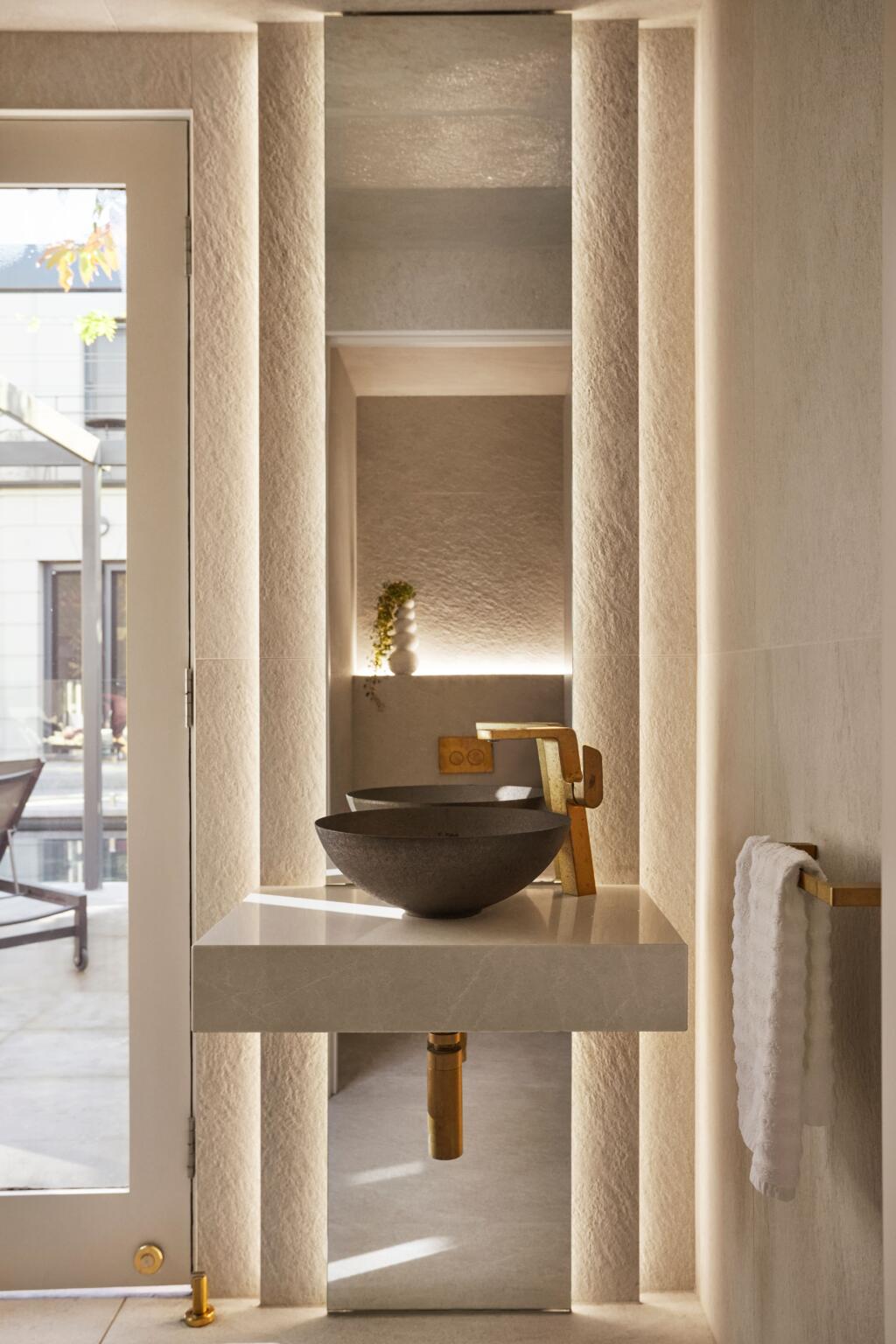 Lewisham Interiors Spa House – luxury bathroom design in Melbourne with stone textures, gold fixtures, and architectural lighting